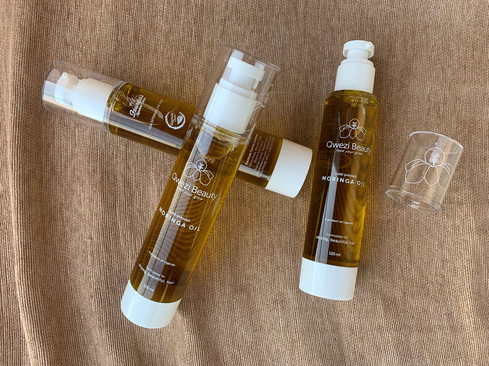 Introducing the 120ml Qwezi Beauty Moringa Oil bottle